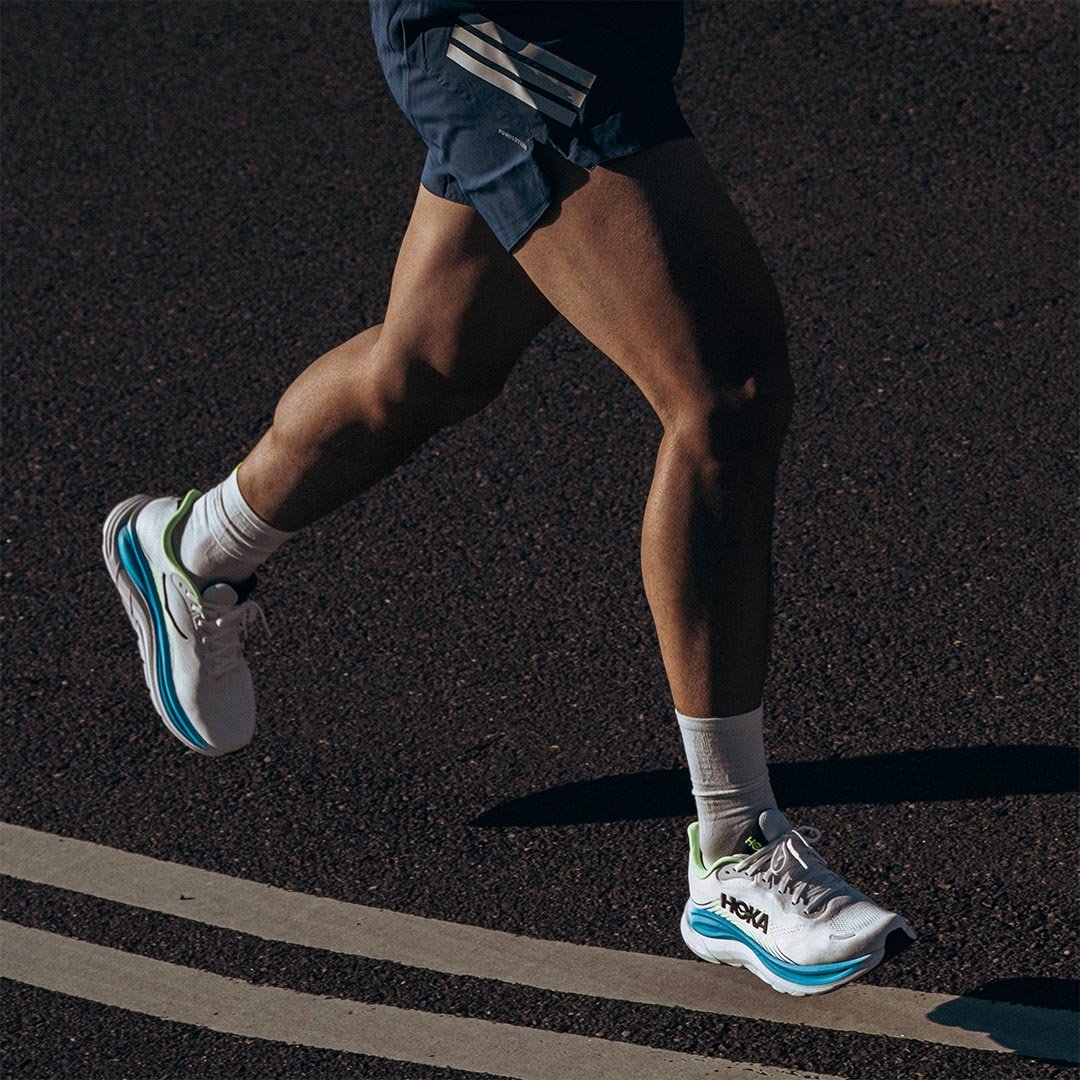 Male running across road